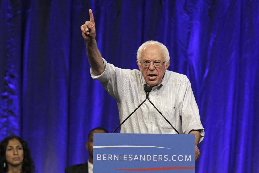 Democratic presidential candidate Bernie Sanders speaks to the crowd at the Los Angeles Memorial Sports Arena on Monday night.