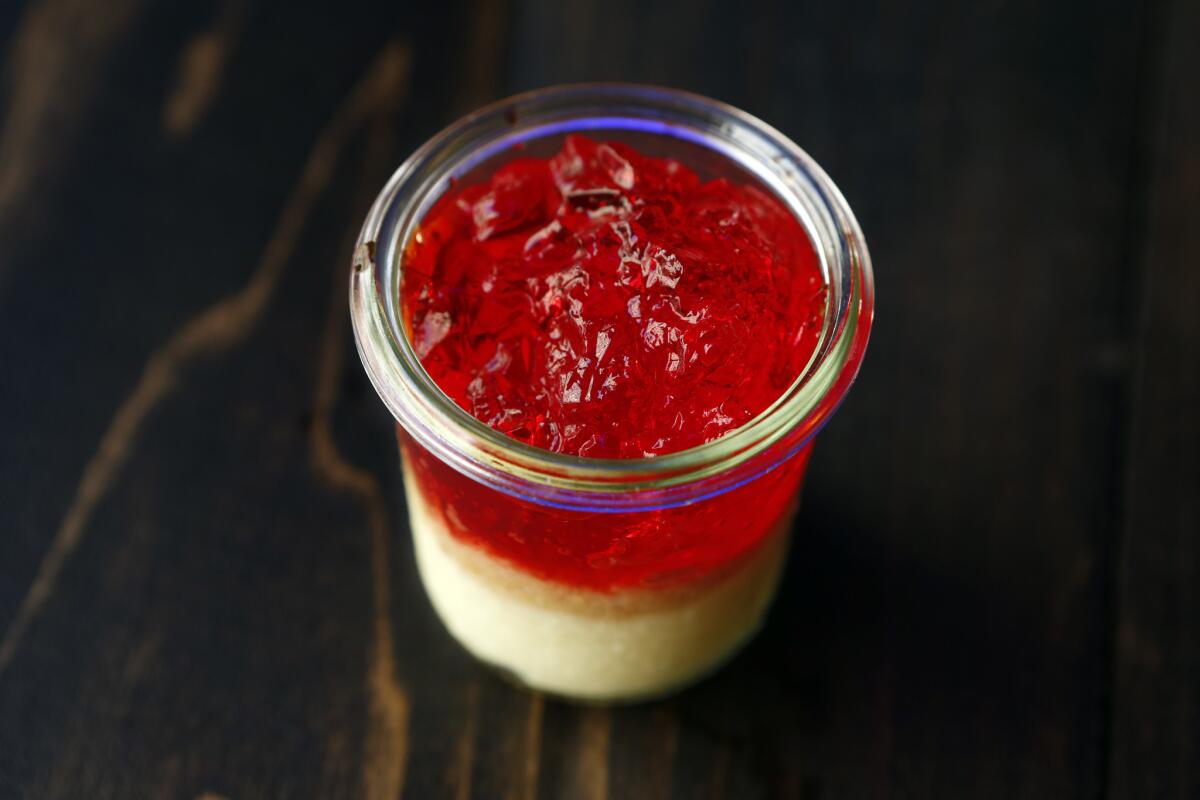 Cherry Jell-O with cheesecake on the bottom is available for 35 cents for the first 35 days of Clifton's cafeteria reopening on Broadway in downtown Los Angeles.