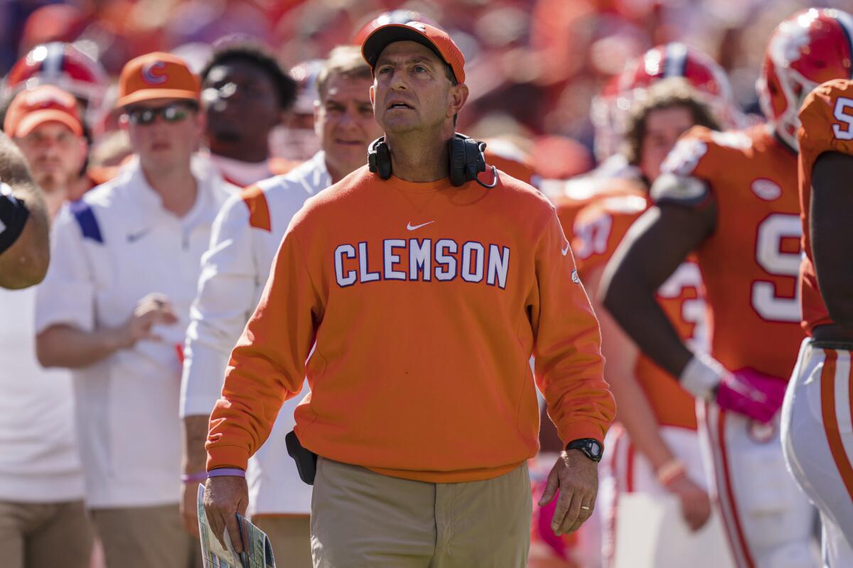 Clemson head coach Dabo Swinney looks on in the second half during an NCAA college football game against Syracuse on Saturday, Oct. 22, 2022, in Clemson, S.C. (AP Photo/Jacob Kupferman)