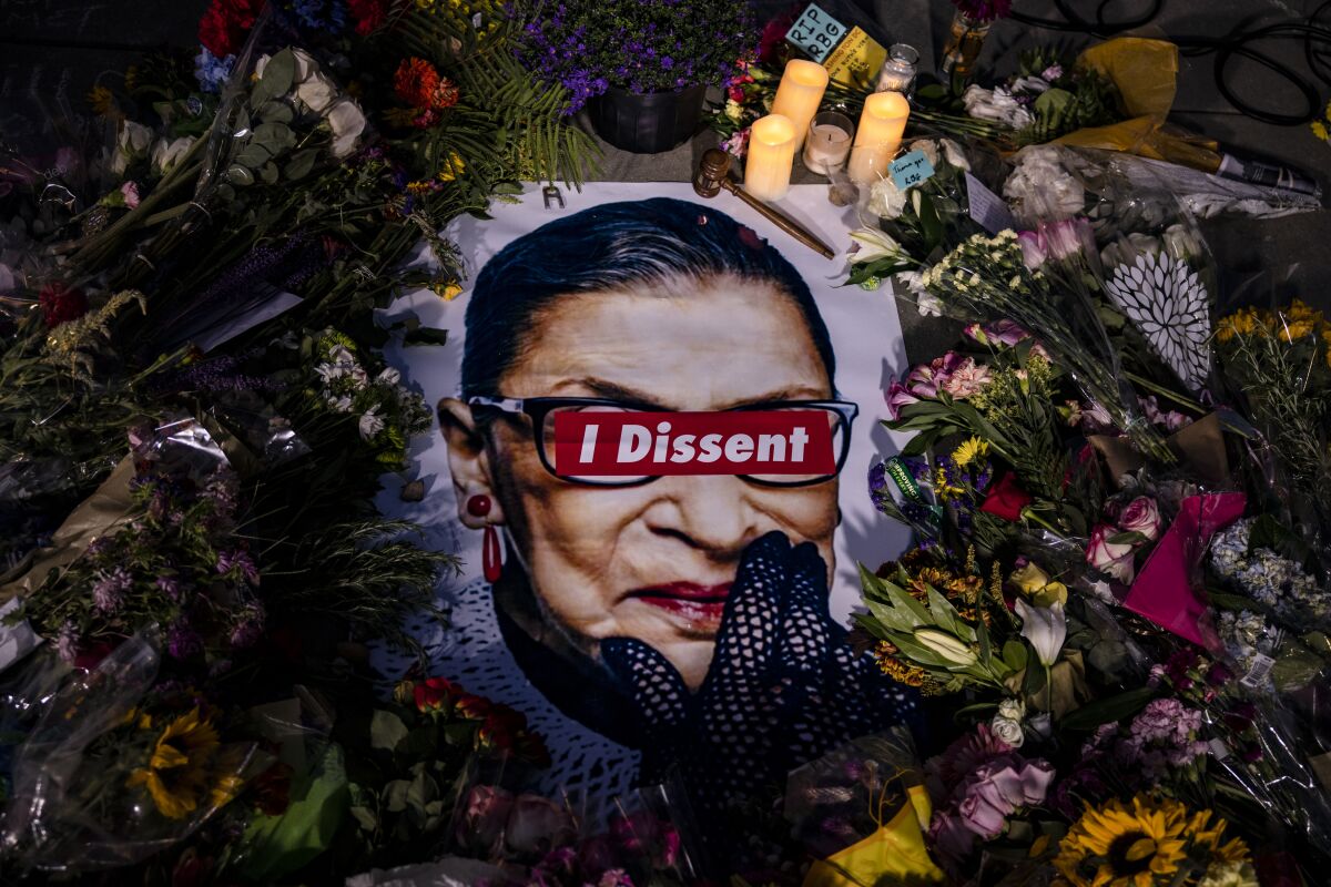 A makeshift memorial for Justice Ruth Bader Ginsburg in front of the U.S. Supreme Court 