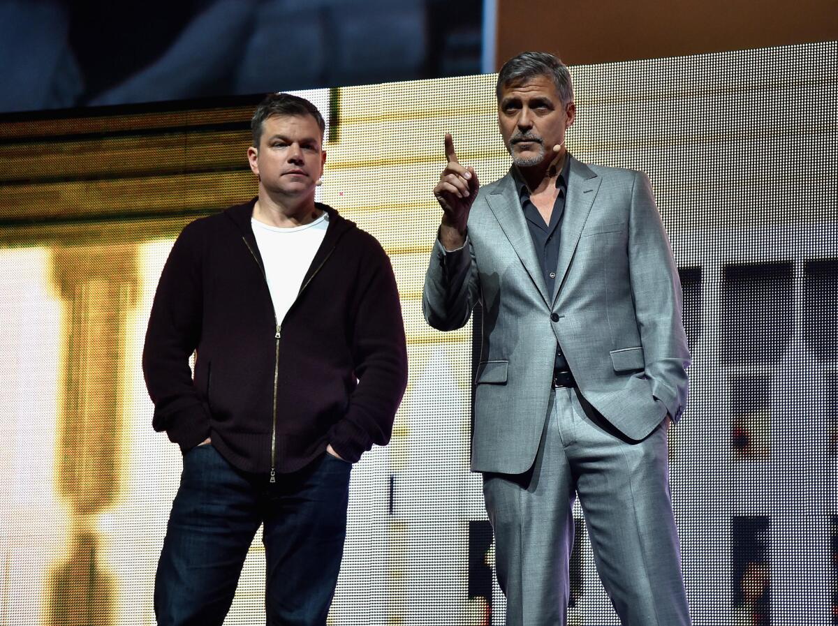 Matt Damon, left, and George Clooney.