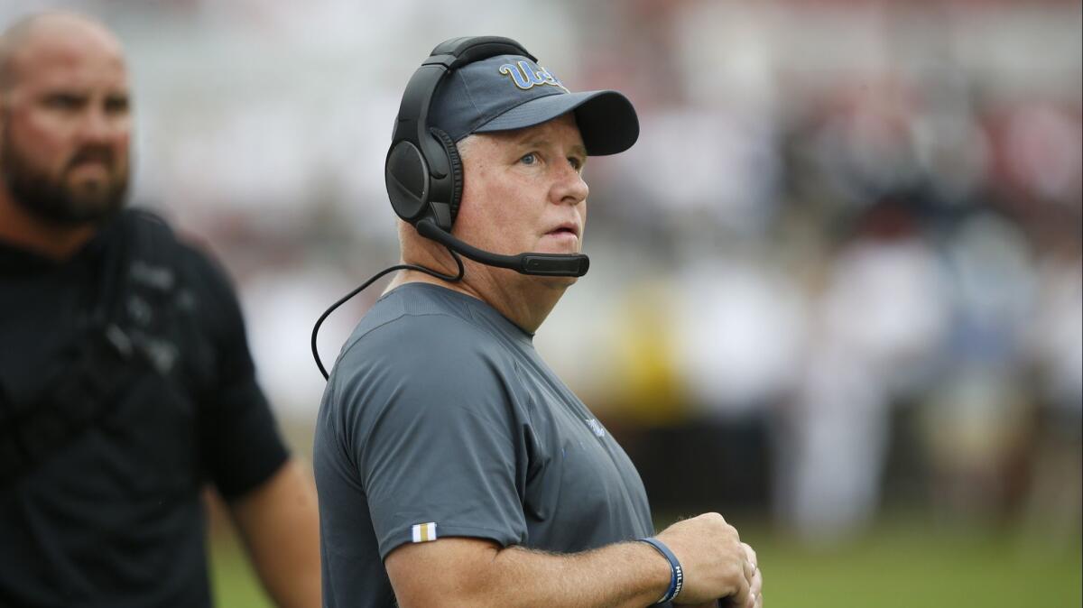 Chip Kelly looks on during a game between UCLA and Oklahoma on Saturday in Norman, Okla.
