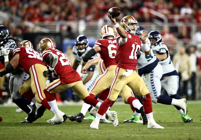 San Francisco 49ers quarterback Jimmy Garoppolo passes during a loss to the Seattle Seahawks on Nov. 11.