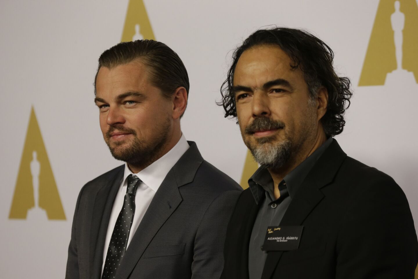 Leonardo DiCaprio, left, and Alejandro G. Inarritu arrive for the 88th annual Academy Awards luncheon at the Beverly Hilton Hotel.