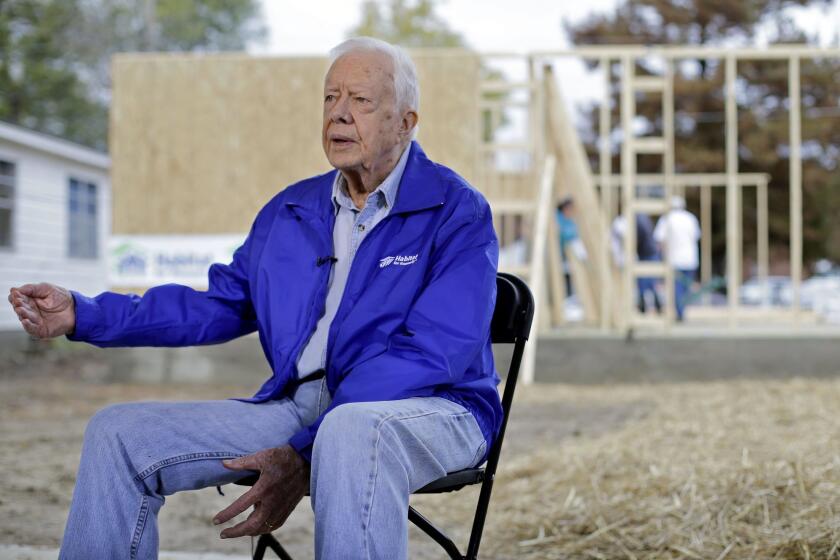 President Jimmy Carter is interviewed at a Habitat for Humanity project site in Memphis, Tenn., on Nov. 1.