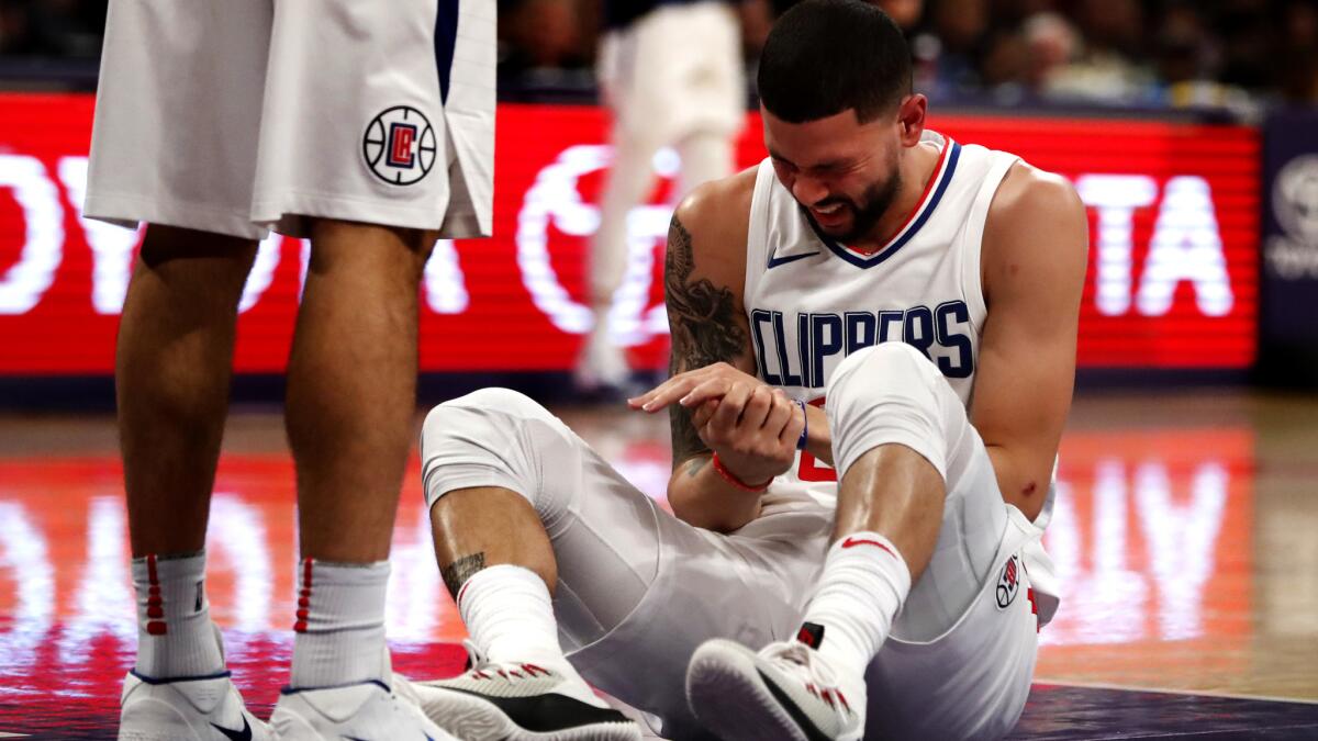 Clippers guard Austin Rivers injured his left hand during the first half. He continued to play until leaving the game in the third quarter because of a strained Achilles' tendon.
