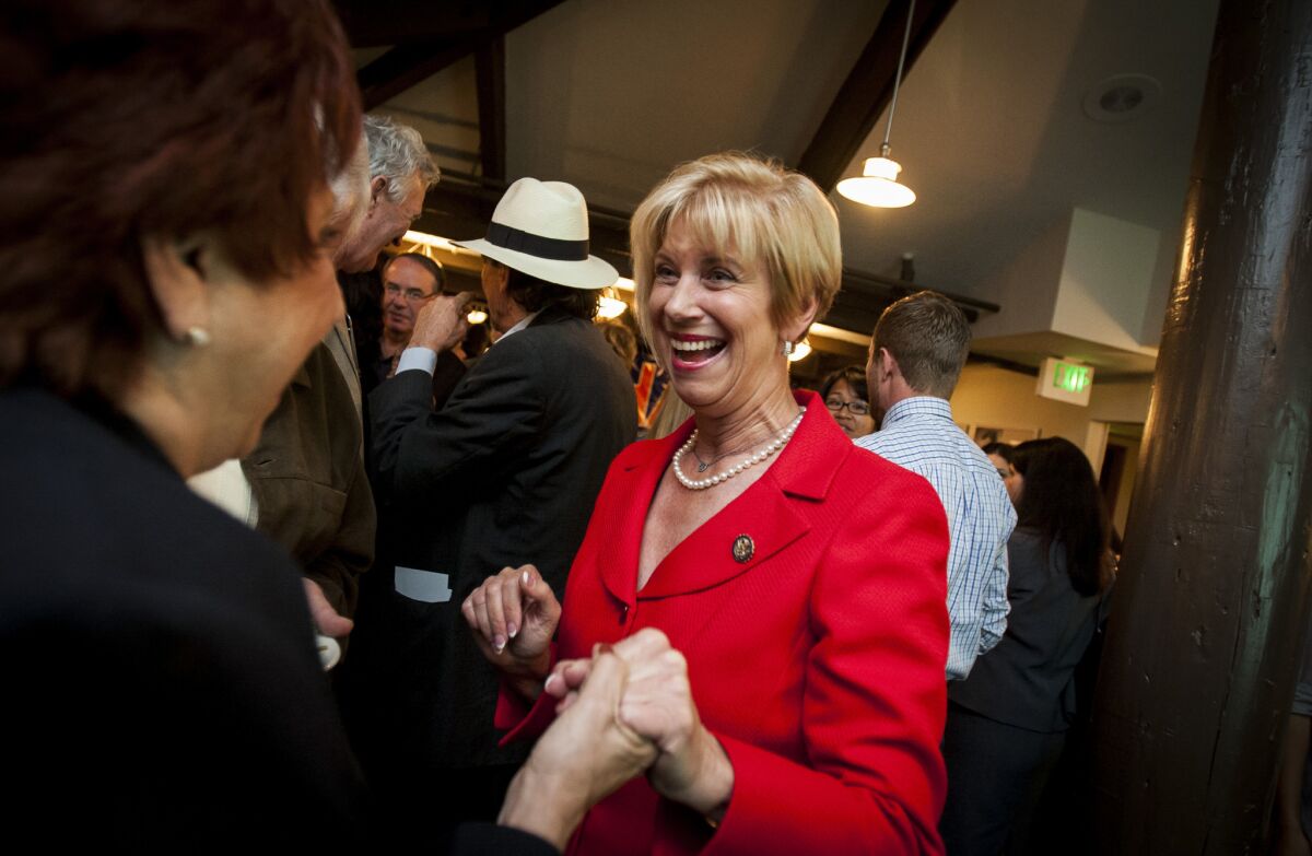Congresswoman Janice Hahn greets a supporter during a 2012 election party at the Ports O'Call restaurant in San Pedro.