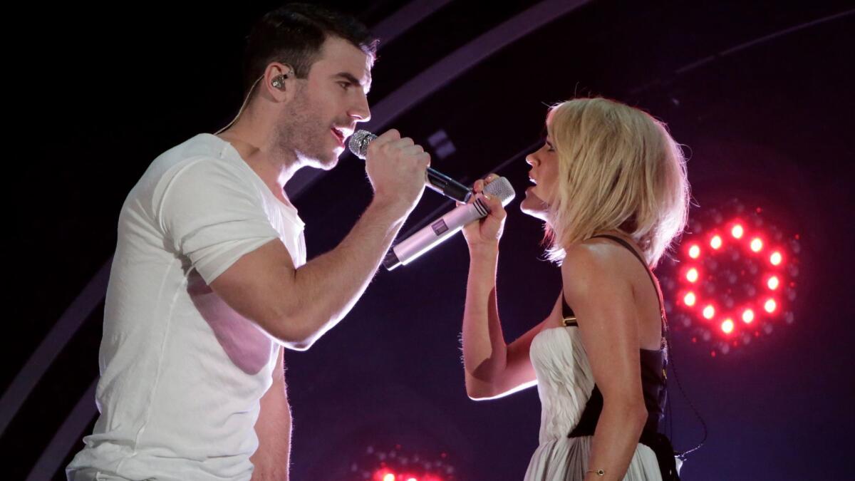Sam Hunt and Carrie Underwood perform at the Grammy Awards at Staples Center in Los Angeles in 2016. Both are among the performers for the 2017 Academy of Country Music Awards.