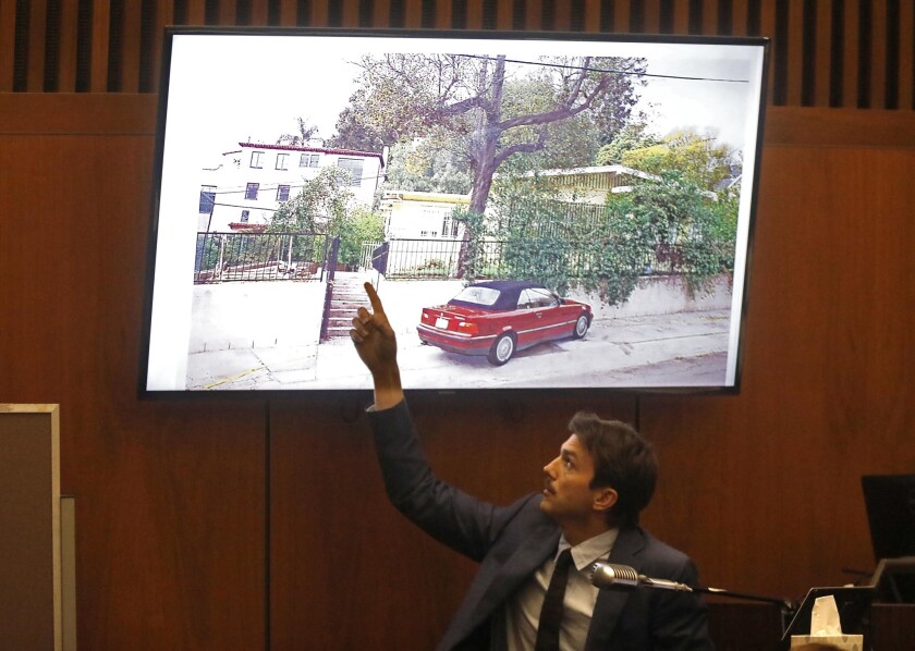 Ashton Kutcher points to a drawing of victim Ashley Ellerin's residence as he testifies in the murder trial of Michael Gargiulo.
