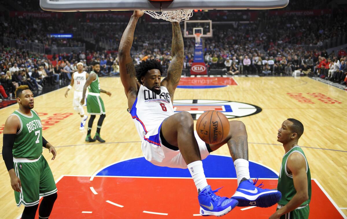 Clippers center DeAndre Jordan dunks against the Boston Celtics during a game last season.
