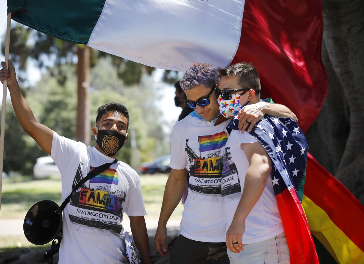 Oscar Rendon, left, Adrian Ramirez, and Sebastian Dunne organized the Love & Equality, Gay Pride Protest.