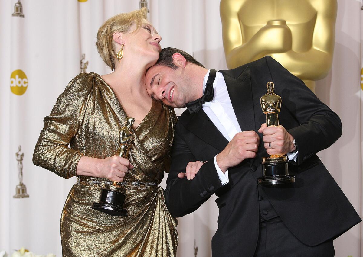 Streep and Jean Dujardin with their Oscars at the 84th Academy Awards Feb. 26, 2012.