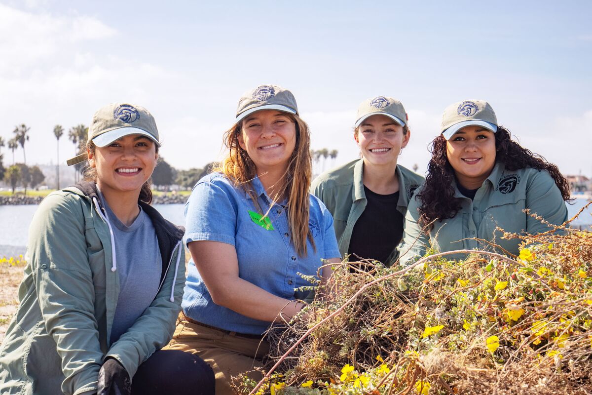 Among those working on a habitat restoration project were Hillary Rivas, Megan Flaherty, Kaylee Cole and Karina Ornelas.