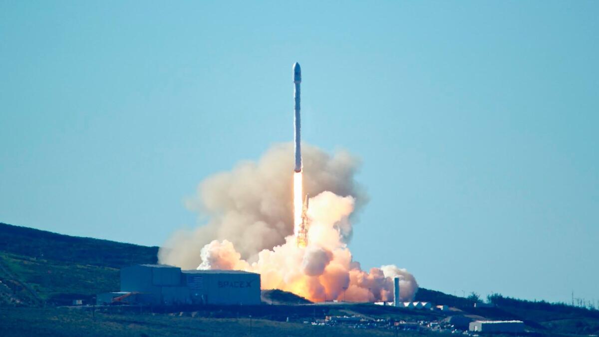 SpaceX's Falcon 9 rocket, carrying 10 satellites, lifts off from Vandenberg Air Force Base on Jan. 14, 2017.