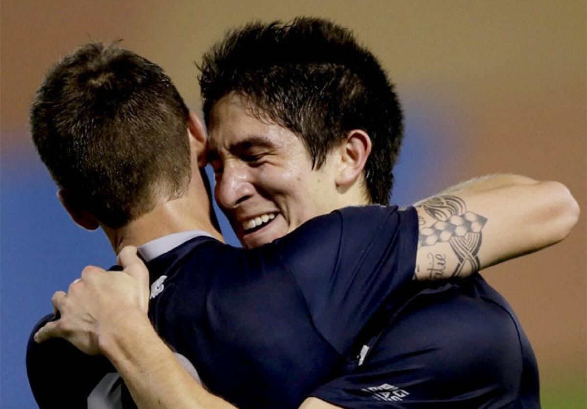 Georgetown's Andy Riemer, right, celebrating a goal by teammate Steve Neumann against Maryland, was drafted the the Galaxy on Tuesday.