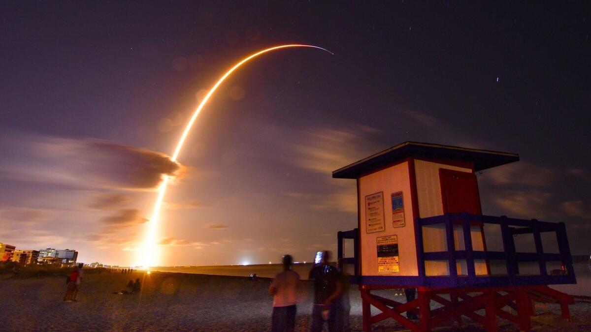 A SpaceX Falcon 9 rocket with a payload of 60 satellites for the Starlink broadband network lifts off from Florida's Cape Canaveral Air Force Station on May 23.