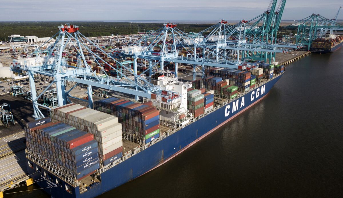 A container ship is unloaded at the Virginia International Gateway terminal in Norfolk. China has announced tariff hikes on $60 billion of U.S. goods in retaliation for President Trump's escalation of a trade dispute.
