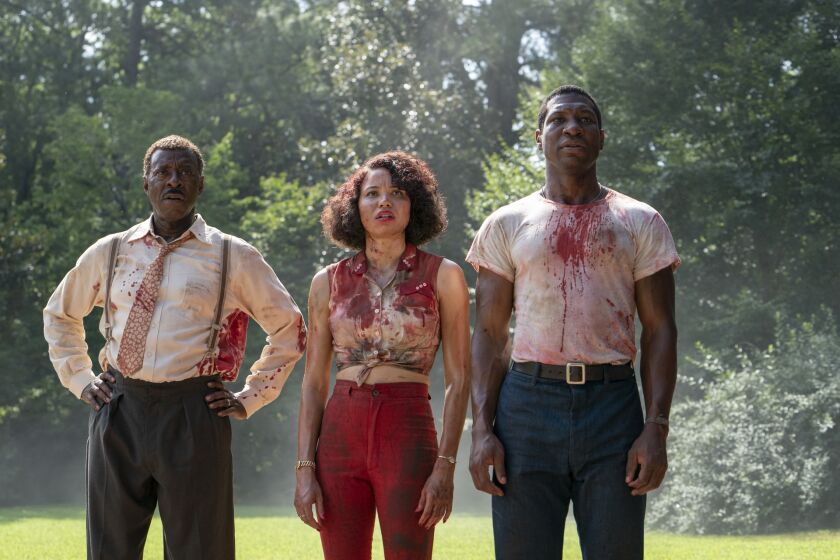 Courtney B. Vance, Jurnee Smollett and Jonathan Majors in a scene from "Lovecraft Country." Credit: Joshua Ade/HBO