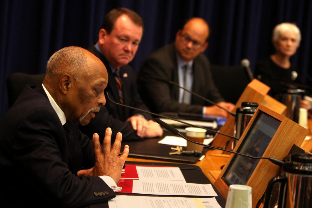 The commission looking into jail abuse, which includes the Rev. Cecil Murray, left, Jim McDonnell, Alex Busansky and Lourdes G. Baird, considered calling on Sheriff Lee Baca to resign but decided against it.