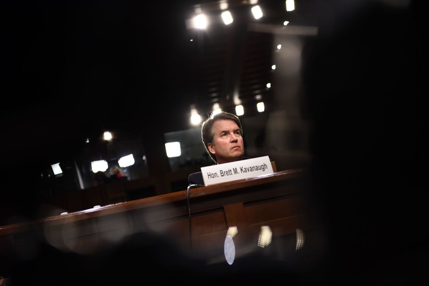 Supreme Court nominee Brett Kavanaugh listens during the first day of his Senate confirmation hearing.