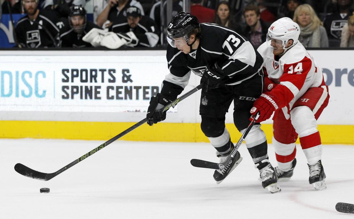 Kings center Tyler Toffoli (73) controls the puck away from Red Wings center Gustav Nyquist during the second period.