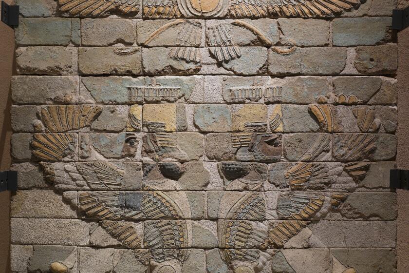 "Two Royal Sphinxes beneath a Winged Disk," Achaemenid, circa 500 BC, brick panel with colored glaze