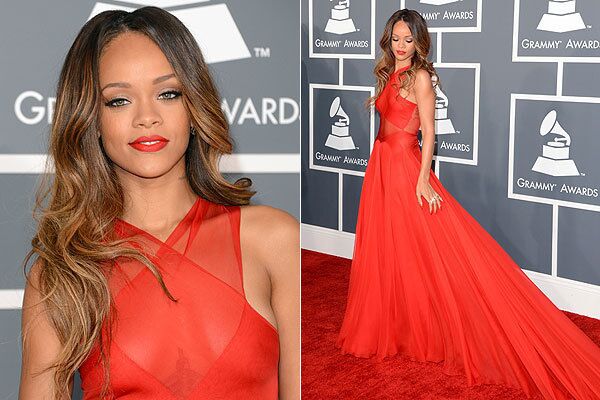 There is nothing sexier than Rihanna in that red-hot gown by fashion insider favorite Azzedine Alaia. At first glance, the cross-front style didn't seem to reveal too much. But upon further inspection, the gossamer-like fabric hinted at everything. With Rihanna's soft, wavy hairstyle and minimal makeup, it was perfection.