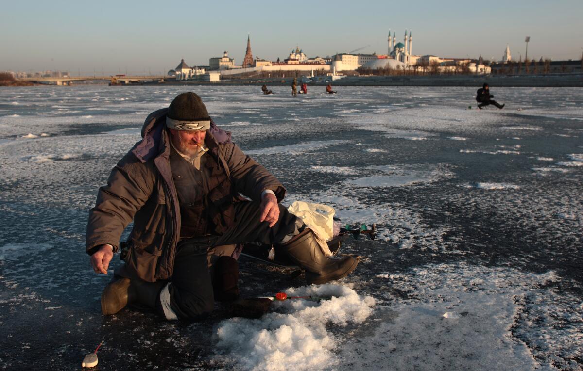 Fishermen on the ice of the Rank Cohanks in Kazan, Russia