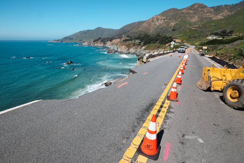 Big Sur, CA - April 02: Hwy. 1 is closed as Caltrans crews assess damage and make shoulder repairs after the road slipped out south of the Rocky Creek Bridge on Tuesday, April 2, 2024 in Big Sur, CA. (Brian van der Brug / Los Angeles Times)