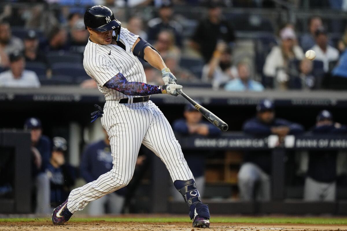 Stanton homers and drives in 4 to power Cole, Yankees to 7-2 win