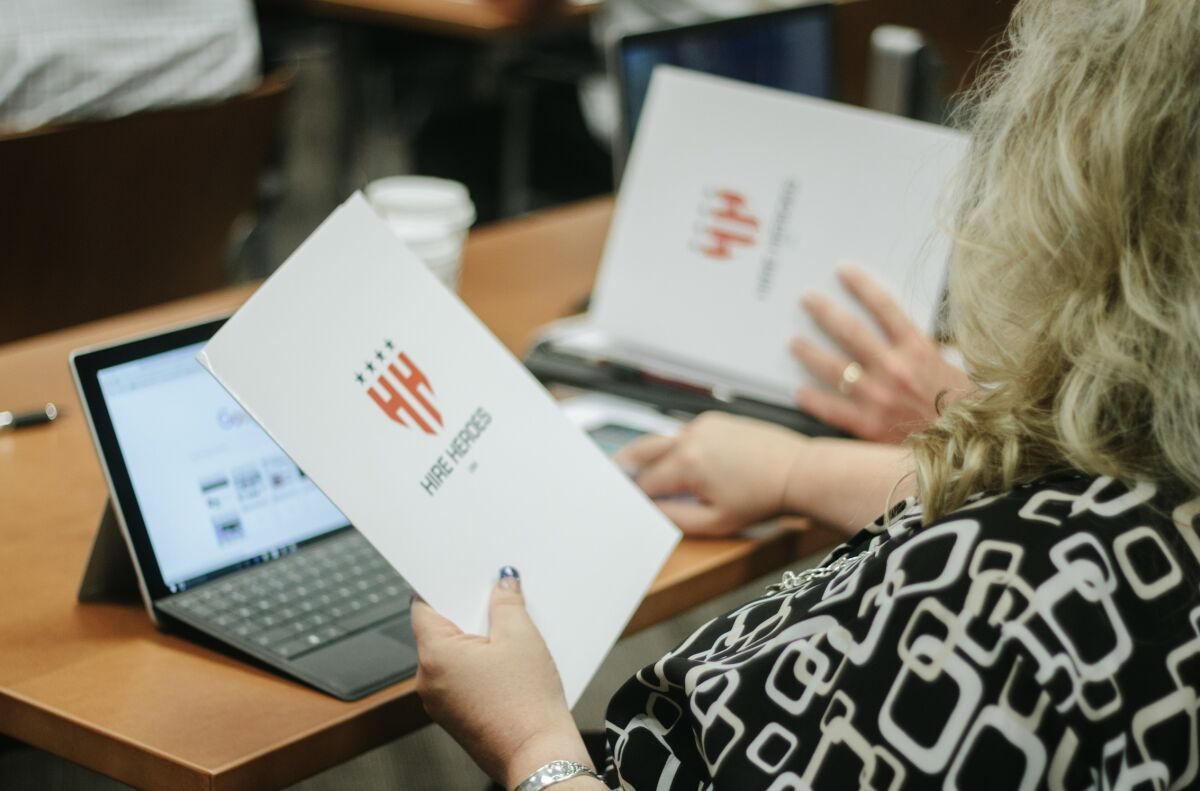 Hire Heroes USA helps military members and their spouses transition to the civilian workforce.