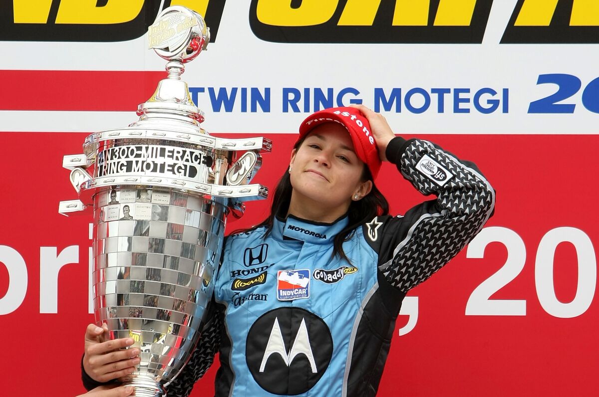 IndyCar Series driver Danica Patrick celebrates after winning at Twin Ring Motegi on April 20, 2008.