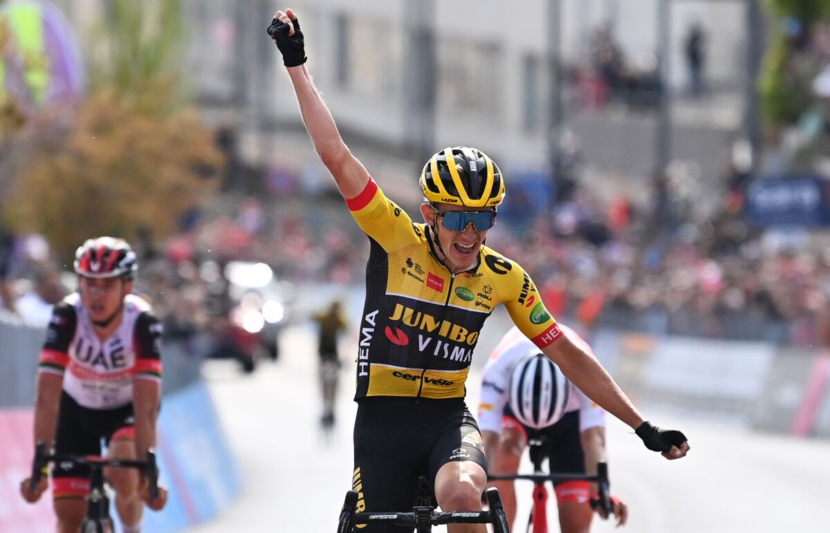 Koen Bouwman, of the Netherlands, celebrates as he crosses the finish line to win during the seventh stage of the Giro D'Italia cycling race from Diamante to Potenza, Italy, Friday, May 13, 2022. (Gian Mattia D'Alberto/LaPresse via AP)