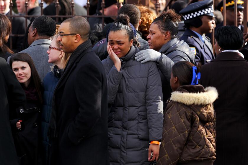 Mourners gather outside Chicago's Greater Harvest Baptist Church before the funeral for 15-year-old Hadiya Pendleton on Saturday.