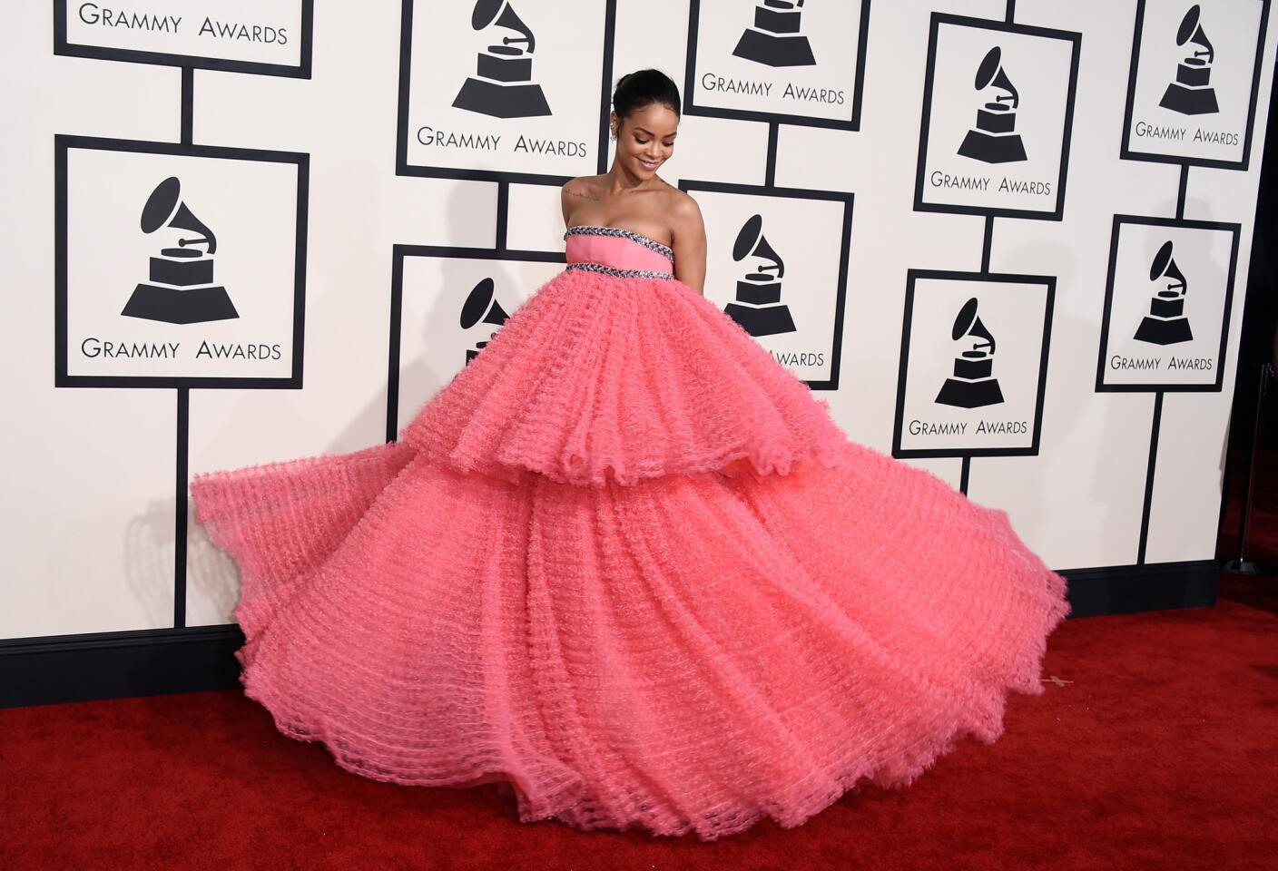 Rihanna arrives at the Grammys in an Empire waist bubble gown by Giambattista Valli. MORE: Show updates | Show highlights | Quotes | Red carpet