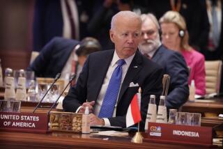 U.S. President Joe Biden listens to the opening remarks of Indian prime minister Narendra Modi during the first session of the G20 Summit, in New Delhi, India, Saturday, Sept. 9, 2023. (AP Photo/Evan Vucci,Pool)