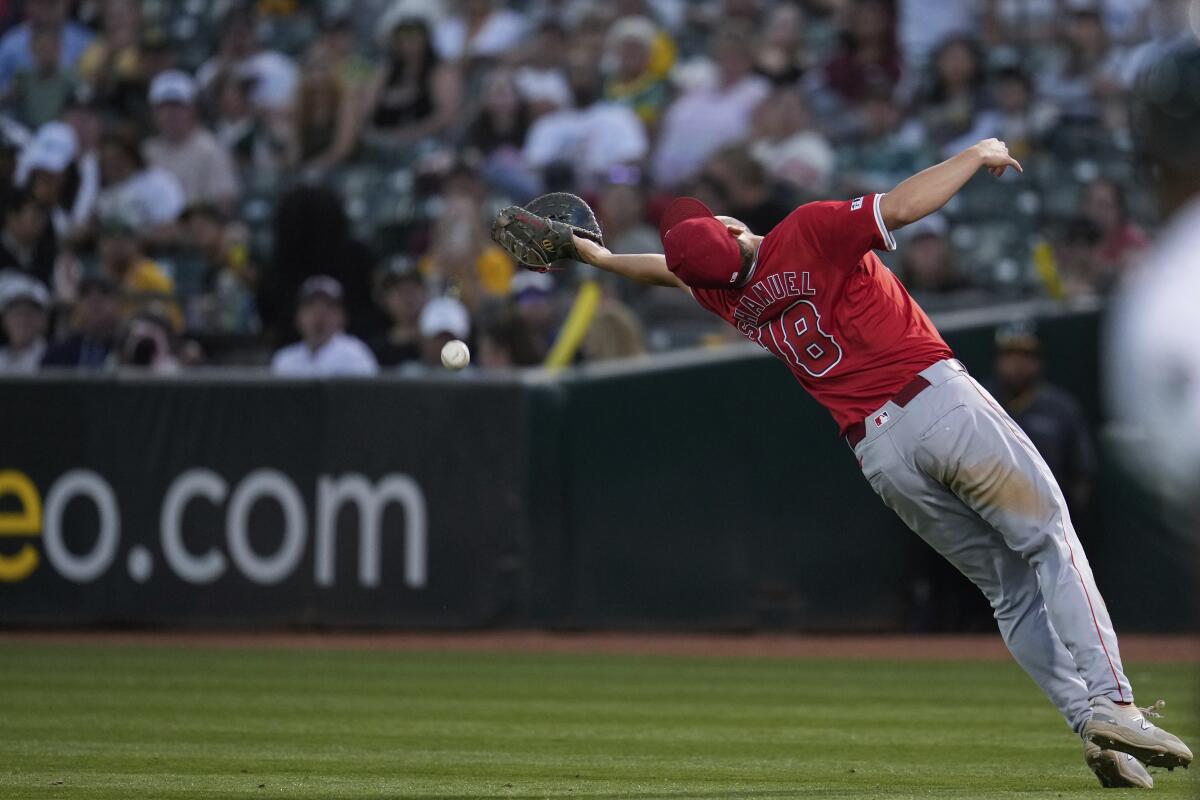 Angels first baseman Nolan Schanuel is unable to catch a ball hit by Zack Gelof in the seventh inning.