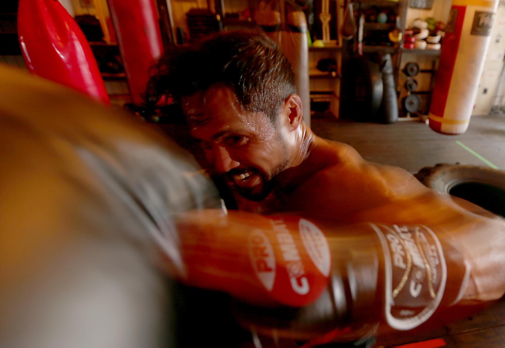 Joel Relampagos throwing a punch during his workout.