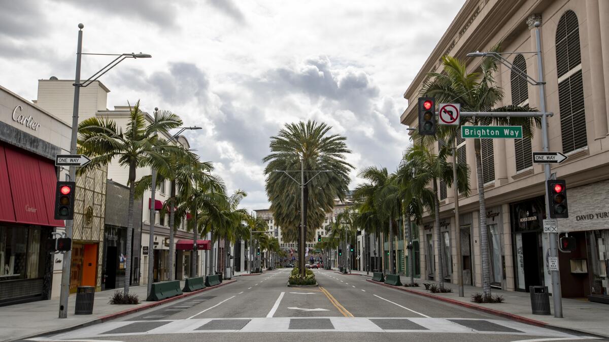 BEVERLY HILLS, LOS ANGELES, CALIFORNIA, USA - MARCH 21: Louis Vuitton  Beverly Hills Rodeo Drive store, temporarily closed due to the coronavirus,  two days after the 'Safer at Home' order issued by