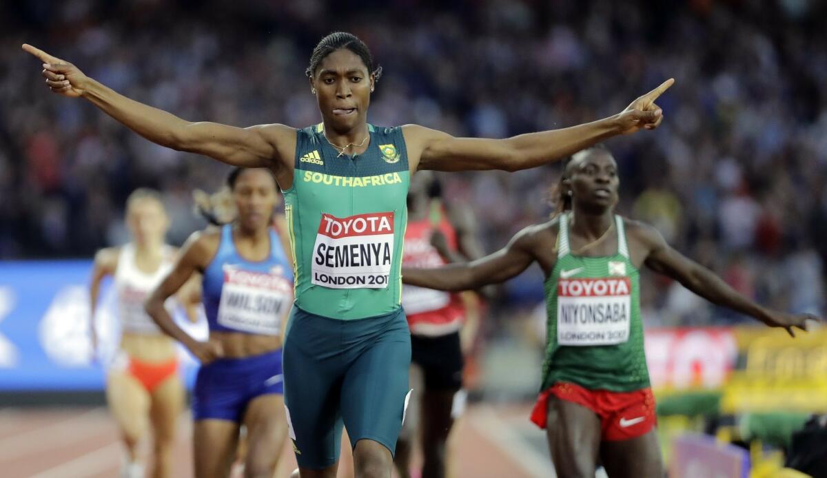 South Africa's Caster Semenya celebrates after winning the women's 800-meter race during the World Athletics Championships on Aug. 13, 2017, in London.