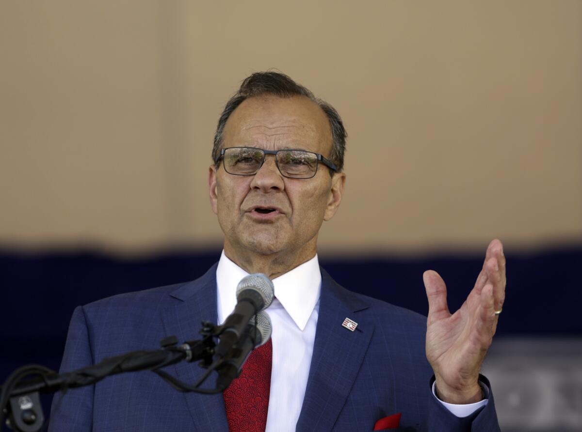 Baseball Hall of Fame inductee Joe Torre speaks during Sunday's induction ceremony in Cooperstown, N.Y.