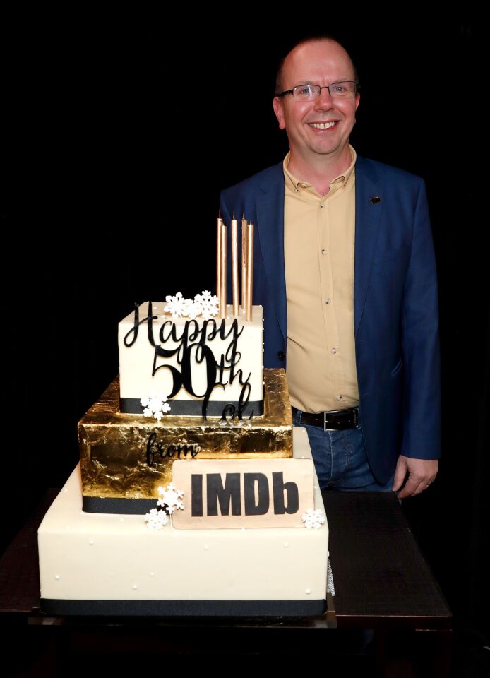 IMDb founder and Chief Executive Col Needham enjoys his 50th birthday party.