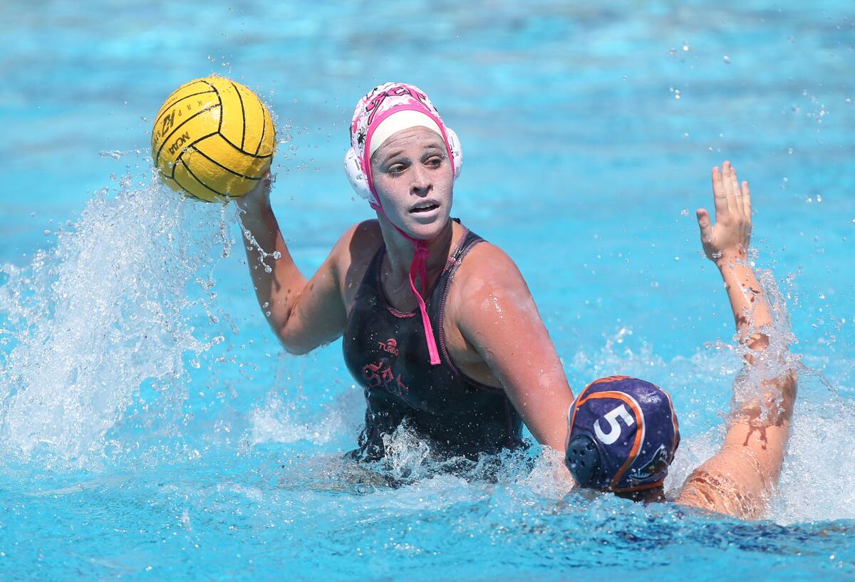 Tea Poljak of the SET 18-and-under Black team prepares to take a shot against the Huntington Beach Orange team in the USA Water Polo Junior Olympics match on Friday at Tustin High.