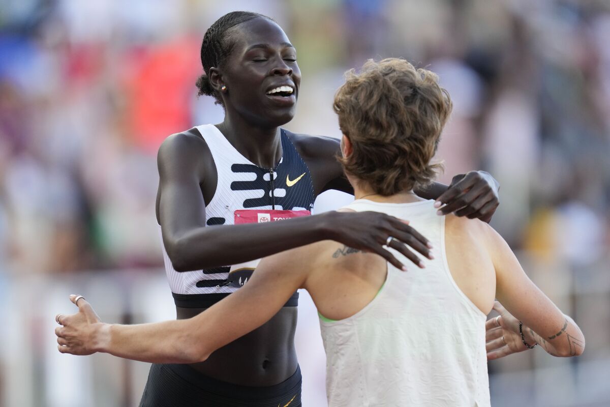 Athing Mu hugs winner Nikki Hiltz after the women's 1,500-meter final during the U.S. track and field championships.
