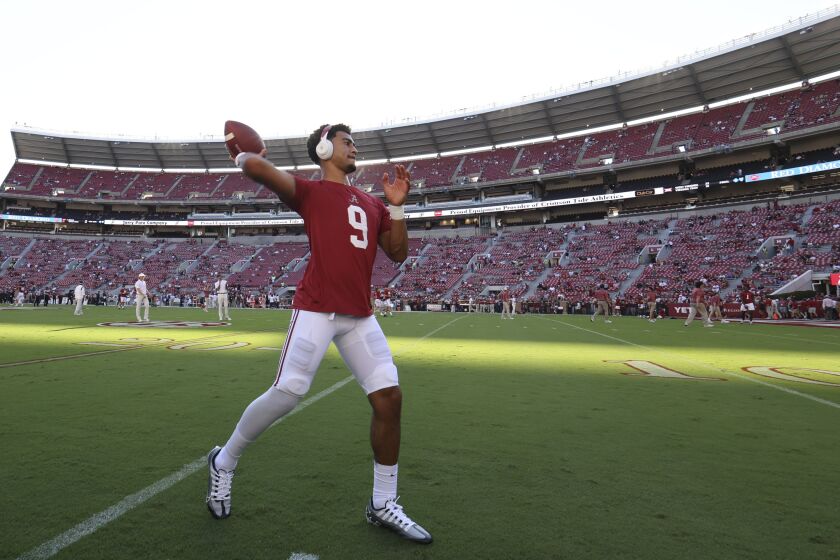 Alabama quarterback Bryce Young warms up for the team's NCAA college football game against Vanderbilt, Saturday, Sept. 24, 2022, in Tuscaloosa, Ala. (AP Photo/Vasha Hunt)