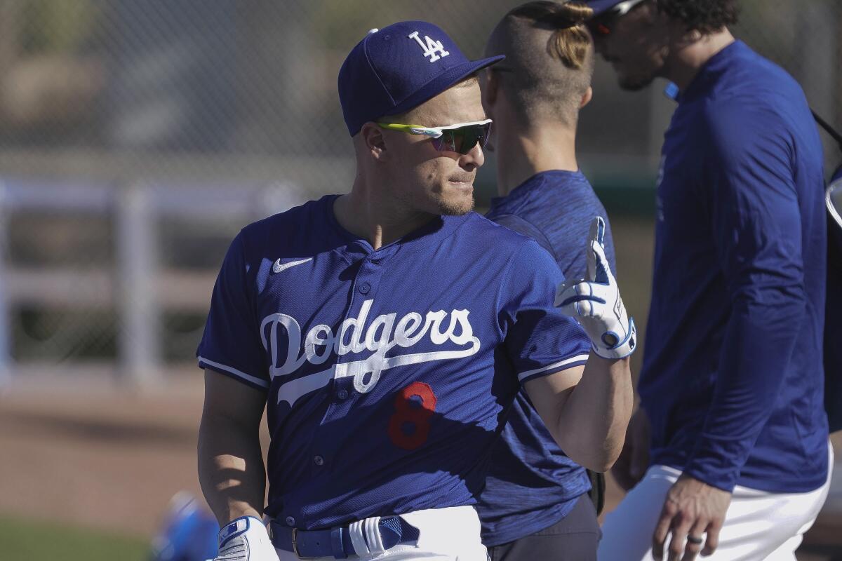 Dodgers infielder Kiké Hernández gestures during spring training at Camelback Ranch on Thursday.