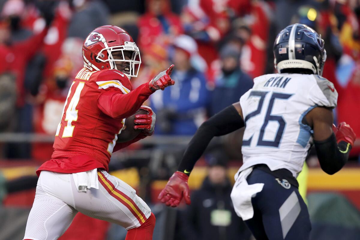 The Chiefs' Sammy Watkins outruns the Titans' Logan Ryan on 60-yard touchdown reception in the AFC championship game. 