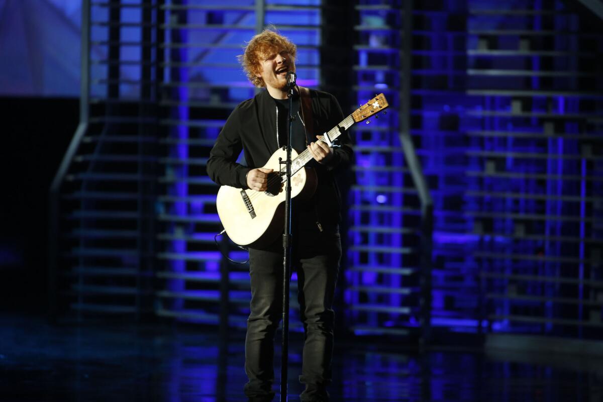 Ed Sheeran performs for the A&E special.