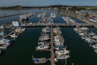 HALF MOON BAY, CALIFORNIA - MARCH 21: Fishing boats are docked at Pillar Point Harbor in Half Moon Bay. This year's salmon fishing season, which typically starts in May, is likely to be severely restricted - or possibly canceled for a second straight year. (Loren Elliott / For The Times)