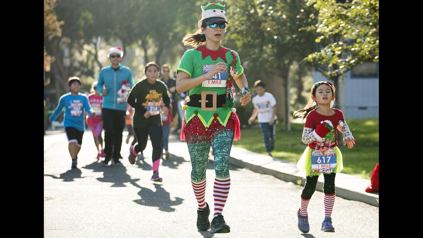 Photo Gallery the 4th Annual “Run for a Claus” 5k and 1mile kids run